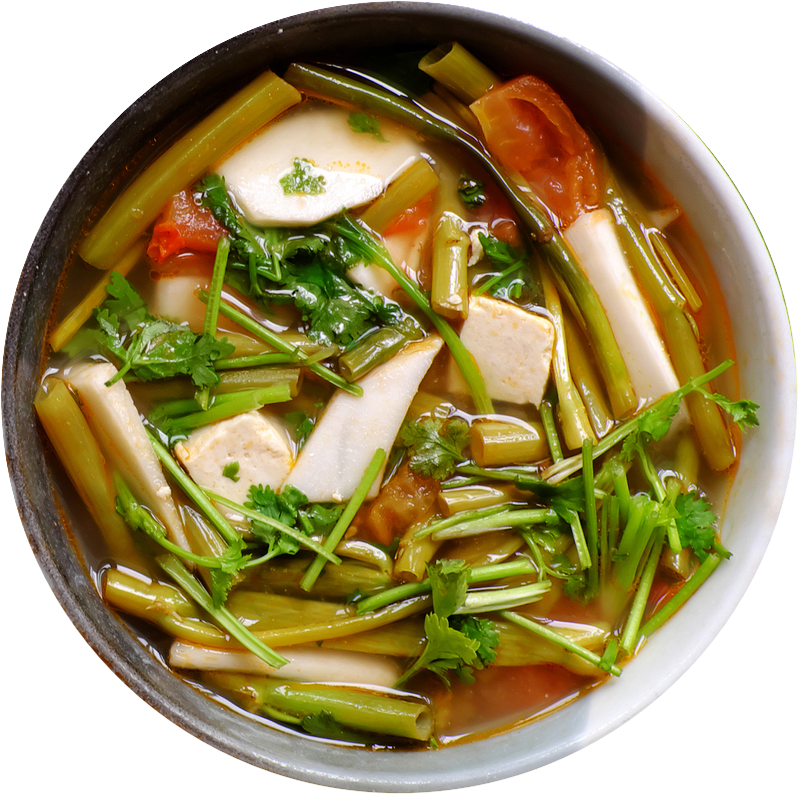A bowl of delicious Vietnamese Pho filled with healthy vegetables and tofu